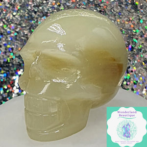 Wonderland Beautique - Green Calcite Skull